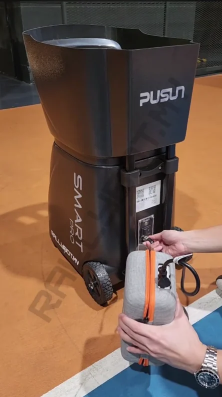 Battery being connected to the Daily Drills pickleball machine